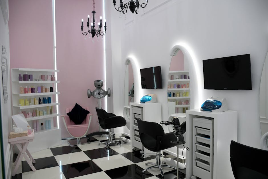 Stylish beauty salon with chic interiors, mirrors, and equipment in Abu Dhabi